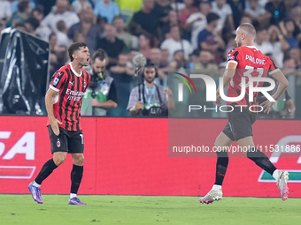 Strahinja Pavlovic of AC Milan celebrates after scoring first goal during the Serie A Enilive match between SS Lazio and AC Milan at Stadio...