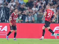 Strahinja Pavlovic of AC Milan celebrates after scoring first goal during the Serie A Enilive match between SS Lazio and AC Milan at Stadio...