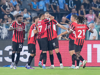 Strahinja Pavlovic of AC Milan celebrates after scoring first goal during the Serie A Enilive match between SS Lazio and AC Milan at Stadio...