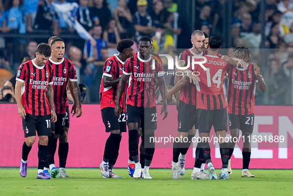 Strahinja Pavlovic of AC Milan celebrates after scoring first goal during the Serie A Enilive match between SS Lazio and AC Milan at Stadio...