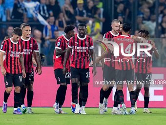 Strahinja Pavlovic of AC Milan celebrates after scoring first goal during the Serie A Enilive match between SS Lazio and AC Milan at Stadio...