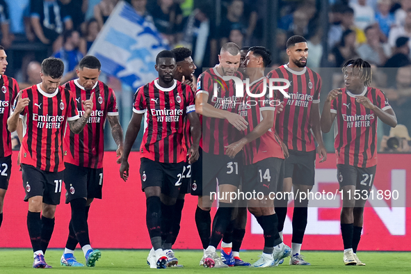 Strahinja Pavlovic of AC Milan celebrates after scoring first goal during the Serie A Enilive match between SS Lazio and AC Milan at Stadio...