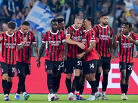 Strahinja Pavlovic of AC Milan celebrates after scoring first goal during the Serie A Enilive match between SS Lazio and AC Milan at Stadio...