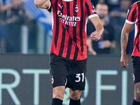 Strahinja Pavlovic of AC Milan celebrates after scoring first goal during the Serie A Enilive match between SS Lazio and AC Milan at Stadio...