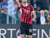 Strahinja Pavlovic of AC Milan celebrates after scoring first goal during the Serie A Enilive match between SS Lazio and AC Milan at Stadio...