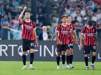 Strahinja Pavlovic of AC Milan celebrates after scoring first goal during the Serie A Enilive match between SS Lazio and AC Milan at Stadio...