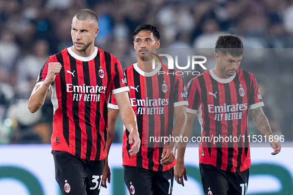 Strahinja Pavlovic of AC Milan celebrates after scoring first goal during the Serie A Enilive match between SS Lazio and AC Milan at Stadio...