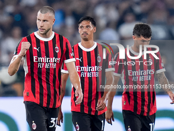 Strahinja Pavlovic of AC Milan celebrates after scoring first goal during the Serie A Enilive match between SS Lazio and AC Milan at Stadio...