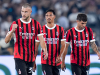 Strahinja Pavlovic of AC Milan celebrates after scoring first goal during the Serie A Enilive match between SS Lazio and AC Milan at Stadio...