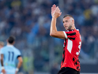 Strahinja Pavlovic of AC Milan celebrates after scoring first goal during the Serie A Enilive match between SS Lazio and AC Milan at Stadio...