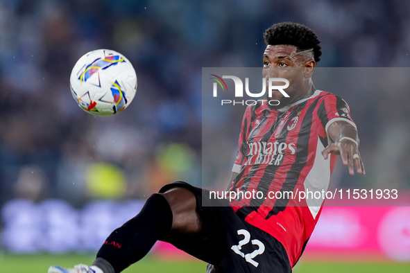 Emerson Royal of AC Milan controls the ball during the Serie A Enilive match between SS Lazio and AC Milan at Stadio Olimpico on Aug 31, 202...