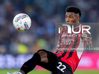 Emerson Royal of AC Milan controls the ball during the Serie A Enilive match between SS Lazio and AC Milan at Stadio Olimpico on Aug 31, 202...