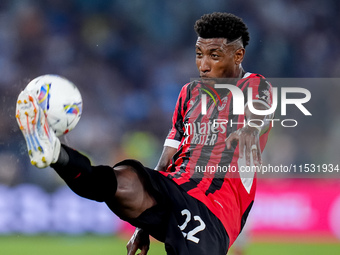 Emerson Royal of AC Milan controls the ball during the Serie A Enilive match between SS Lazio and AC Milan at Stadio Olimpico on Aug 31, 202...