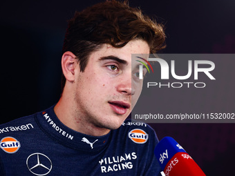 Franco Colapinto of Williams talks to media after the qualifying session ahead of the Italian Formula One Grand Prix at Autodromo Nazionale...