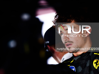 Charles Leclerc of Ferrari talks to media after the qualifying session ahead of the Italian Formula One Grand Prix at Autodromo Nazionale Mo...