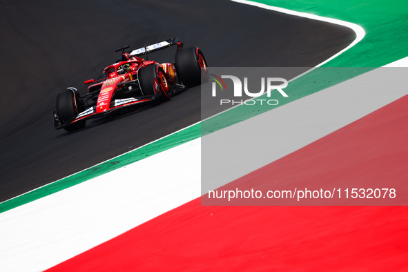 Charles Leclerc of Ferrari drives a car on the track during the third practice session, ahead of the Italian Formula One Grand Prix at Autod...