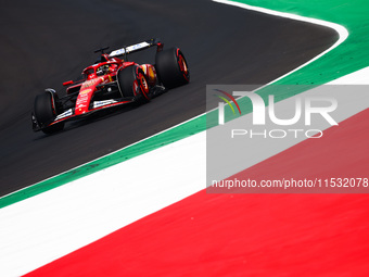 Charles Leclerc of Ferrari drives a car on the track during the third practice session, ahead of the Italian Formula One Grand Prix at Autod...