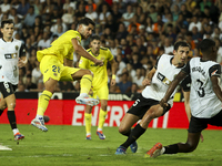 Villarreal's Ayoze Perez Gutierrez scores the 1-1 goal during the La Liga match between Valencia CF and Villarreal CF at Mestalla Stadium in...