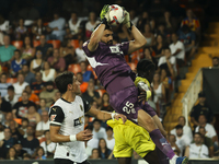 Giorgi Mamardashvili of Valencia CF jumps for the ball during the La Liga match between Valencia CF and Villarreal CF at Mestalla Stadium in...