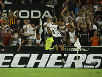 Hugo Duro of Valencia CF celebrates after scoring the 1-0 goal during the La Liga match between Valencia CF and Villarreal CF at Mestalla St...