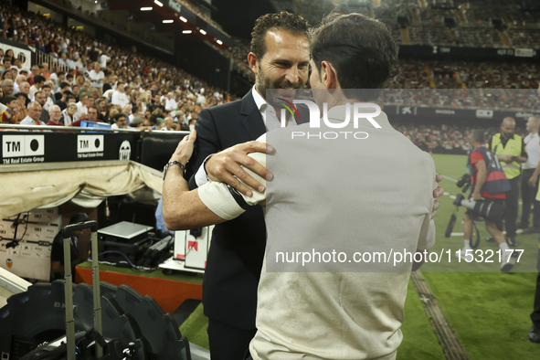 Head coach of Valencia CF, Ruben Baraja, and head coach of Villarreal CF, Marcelino Garcia Toral, before the La Liga match between Valencia...