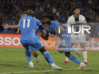 Frank Zambo Anguissa of Napoli celebrates after scoring their second goal during the Serie A soccer match between SSC Napoli and Parma Calci...