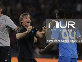 Frank Zambo Anguissa of Napoli celebrates after scoring their second goal during the Serie A soccer match between SSC Napoli and Parma Calci...