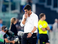 Paulo Fonseca head coach of AC Milan looks dejected during the Serie A Enilive match between SS Lazio and AC Milan at Stadio Olimpico on Aug...