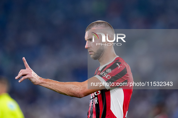 Strahinja Pavlovic of AC Milan gestures during the Serie A Enilive match between SS Lazio and AC Milan at Stadio Olimpico on Aug 31, 2024 in...