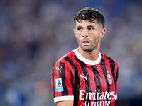 Christian Pulisic of AC Milan looks on during the Serie A Enilive match between SS Lazio and AC Milan at Stadio Olimpico on Aug 31, 2024 in...