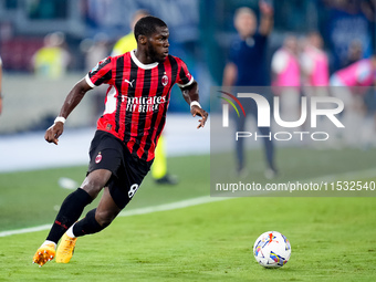 Yunus Musah of AC Milan in action during the Serie A Enilive match between SS Lazio and AC Milan at Stadio Olimpico on Aug 31, 2024 in Rome,...