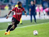 Yunus Musah of AC Milan in action during the Serie A Enilive match between SS Lazio and AC Milan at Stadio Olimpico on Aug 31, 2024 in Rome,...