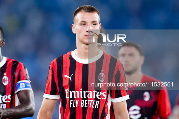 Francesco Camarda of AC Milan looks on during the Serie A Enilive match between SS Lazio and AC Milan at Stadio Olimpico on Aug 31, 2024 in...