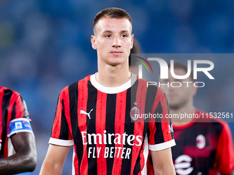 Francesco Camarda of AC Milan looks on during the Serie A Enilive match between SS Lazio and AC Milan at Stadio Olimpico on Aug 31, 2024 in...