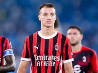 Francesco Camarda of AC Milan looks on during the Serie A Enilive match between SS Lazio and AC Milan at Stadio Olimpico on Aug 31, 2024 in...