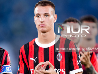 Francesco Camarda of AC Milan looks on during the Serie A Enilive match between SS Lazio and AC Milan at Stadio Olimpico on Aug 31, 2024 in...