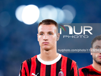 Francesco Camarda of AC Milan looks on during the Serie A Enilive match between SS Lazio and AC Milan at Stadio Olimpico on Aug 31, 2024 in...