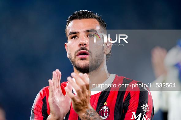 Theo Hernandez of AC Milan applauds his supporters during the Serie A Enilive match between SS Lazio and AC Milan at Stadio Olimpico on Aug...