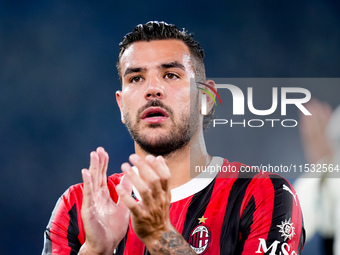 Theo Hernandez of AC Milan applauds his supporters during the Serie A Enilive match between SS Lazio and AC Milan at Stadio Olimpico on Aug...