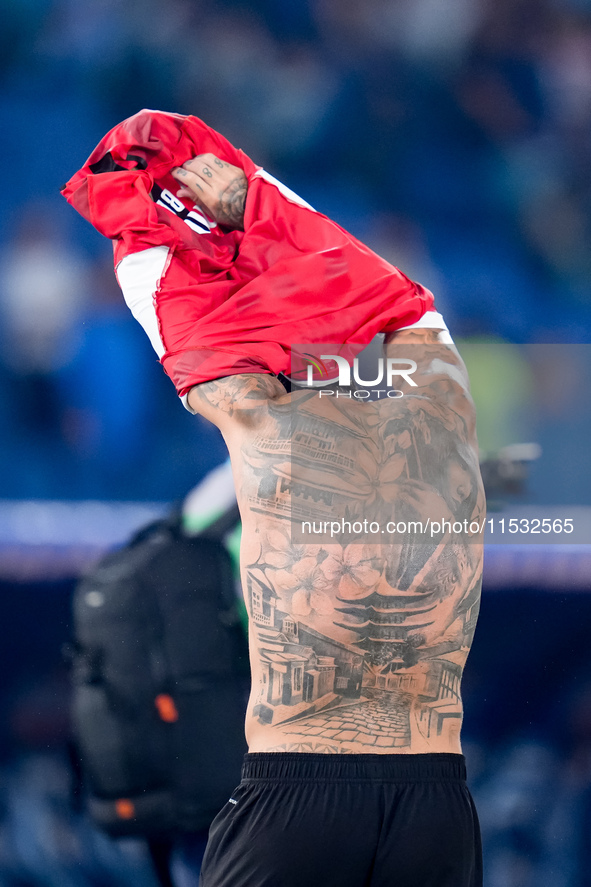 Theo Hernandez of AC Milan shows his tattoos during the Serie A Enilive match between SS Lazio and AC Milan at Stadio Olimpico on Aug 31, 20...