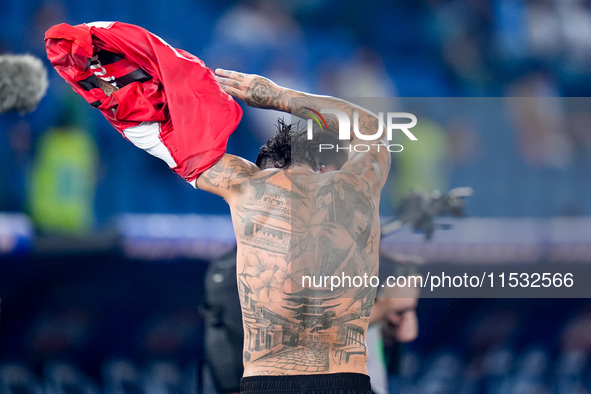 Theo Hernandez of AC Milan shows his tattoos during the Serie A Enilive match between SS Lazio and AC Milan at Stadio Olimpico on Aug 31, 20...