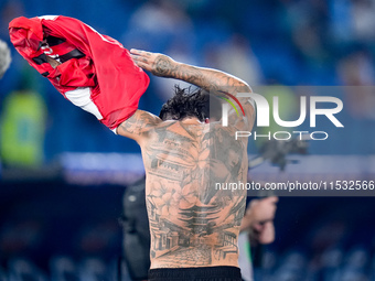 Theo Hernandez of AC Milan shows his tattoos during the Serie A Enilive match between SS Lazio and AC Milan at Stadio Olimpico on Aug 31, 20...