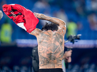 Theo Hernandez of AC Milan shows his tattoos during the Serie A Enilive match between SS Lazio and AC Milan at Stadio Olimpico on Aug 31, 20...