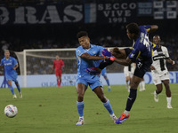 Parma's Zion Suzuki and David Neres of Napoli during the Serie A soccer match between SSC Napoli and Parma Calcio at Stadio Maradona in Napl...