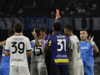 Parma's Zion Suzuki and David Neres of Napoli during the Serie A soccer match between SSC Napoli and Parma Calcio at Stadio Maradona in Napl...