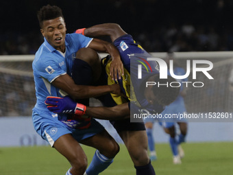 Parma's Zion Suzuki and David Neres of Napoli during the Serie A soccer match between SSC Napoli and Parma Calcio at Stadio Maradona in Napl...