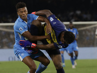 Parma's Zion Suzuki and David Neres of Napoli during the Serie A soccer match between SSC Napoli and Parma Calcio at Stadio Maradona in Napl...