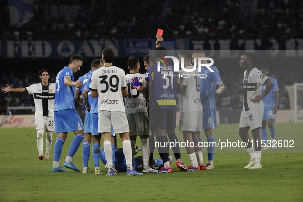 Parma's Zion Suzuki and David Neres of Napoli during the Serie A soccer match between SSC Napoli and Parma Calcio at Stadio Maradona in Napl...