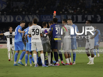 Parma's Zion Suzuki and David Neres of Napoli during the Serie A soccer match between SSC Napoli and Parma Calcio at Stadio Maradona in Napl...