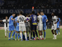 Parma's Zion Suzuki and David Neres of Napoli during the Serie A soccer match between SSC Napoli and Parma Calcio at Stadio Maradona in Napl...